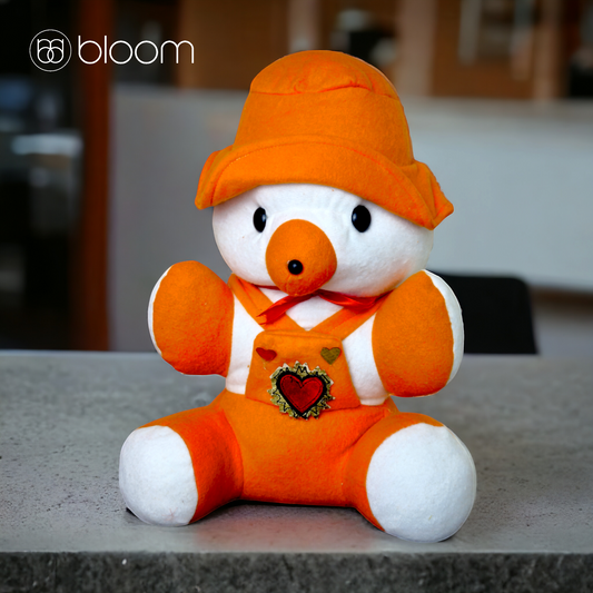 Adorable Orange Teddy Bear with Heart Emblem